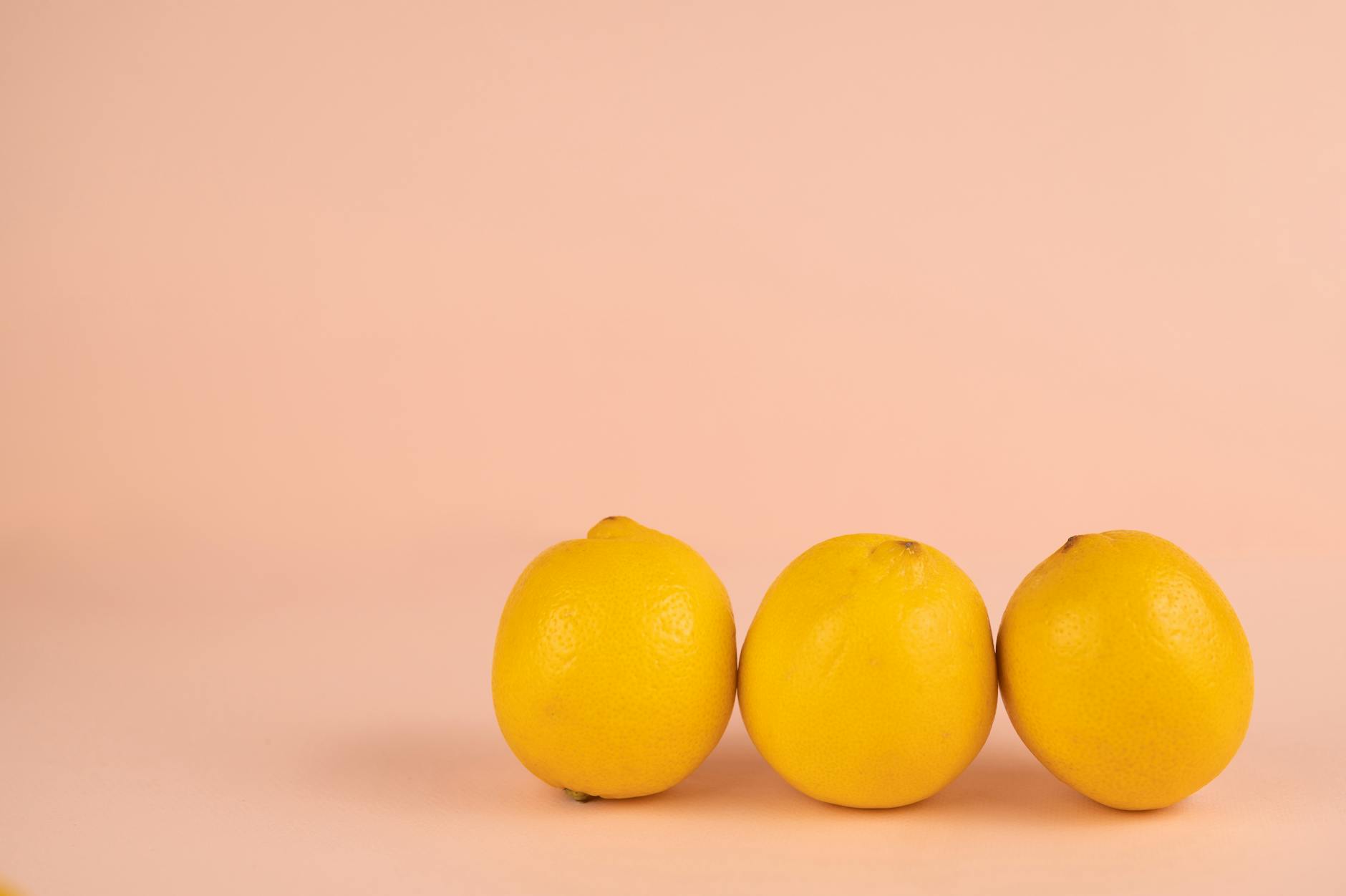 Vibrant sex toys arranged on a bright yellow surface, showcasing diverse designs for extended pleasure